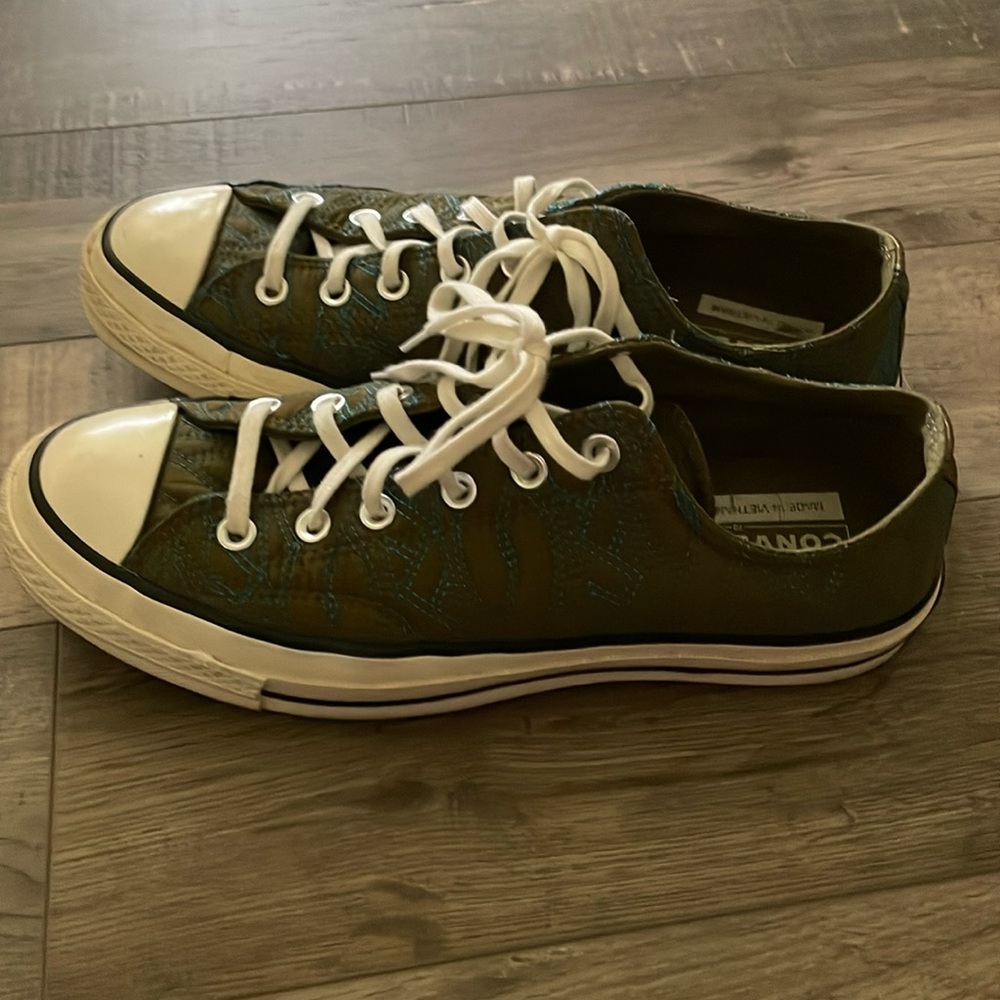 Converse women’s sneakers. Green with blue thread pattern.